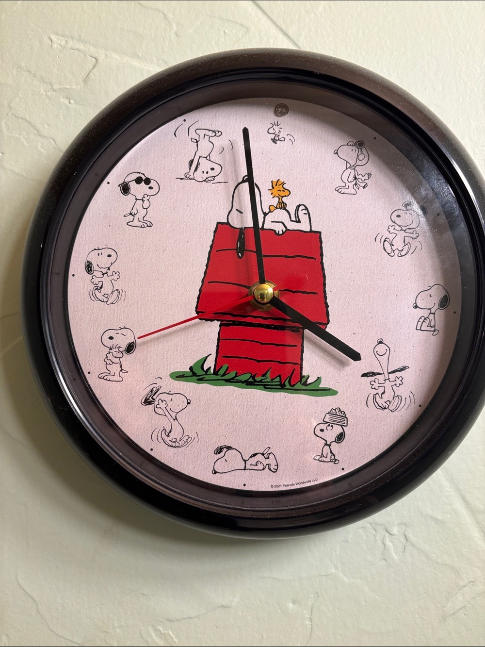 Peanuts Snoopy Red Doghouse Musical Wall Clock - Black Frame